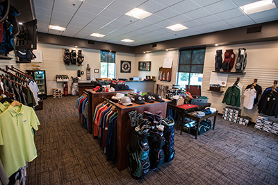 Photo of the pro shop stocked with golf shirts, golf clubs, golf shoes, and more!